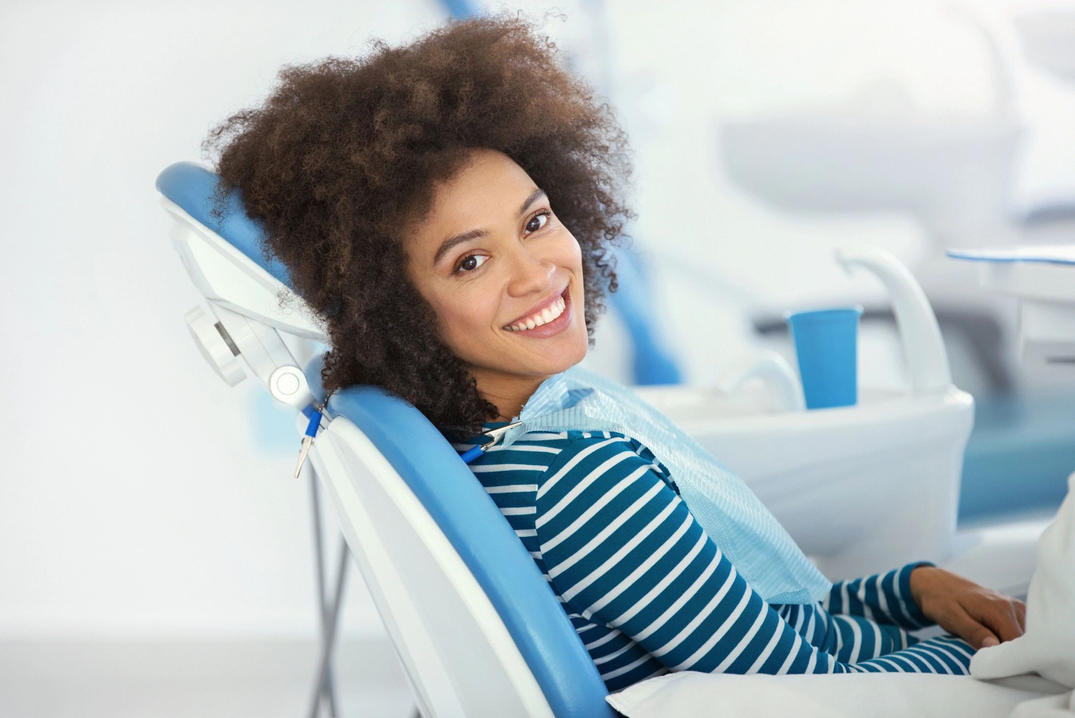 Smiling dental patient after treatment