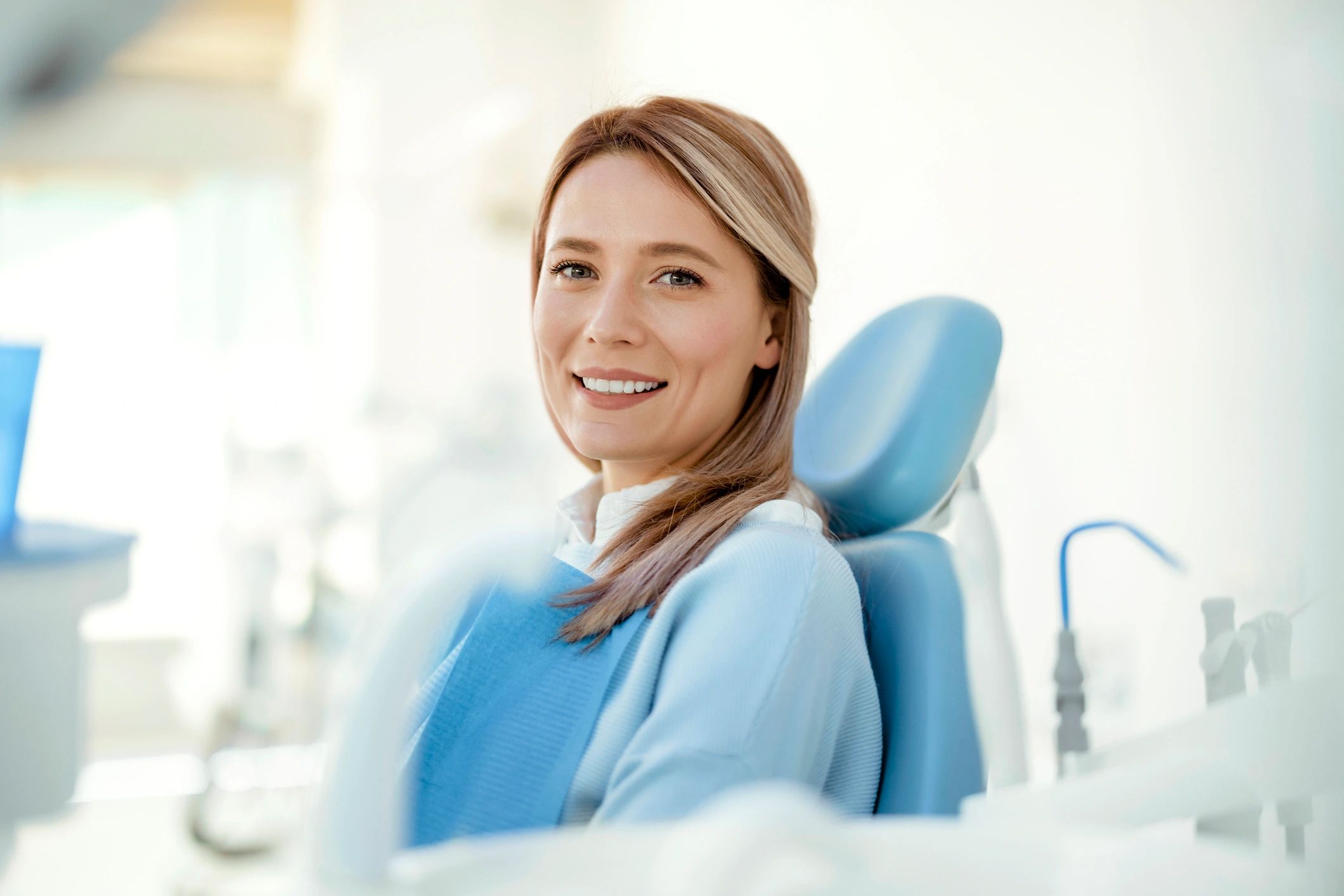 Young woman smiling during a dental visit